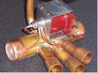coil mounted on reversing valve
